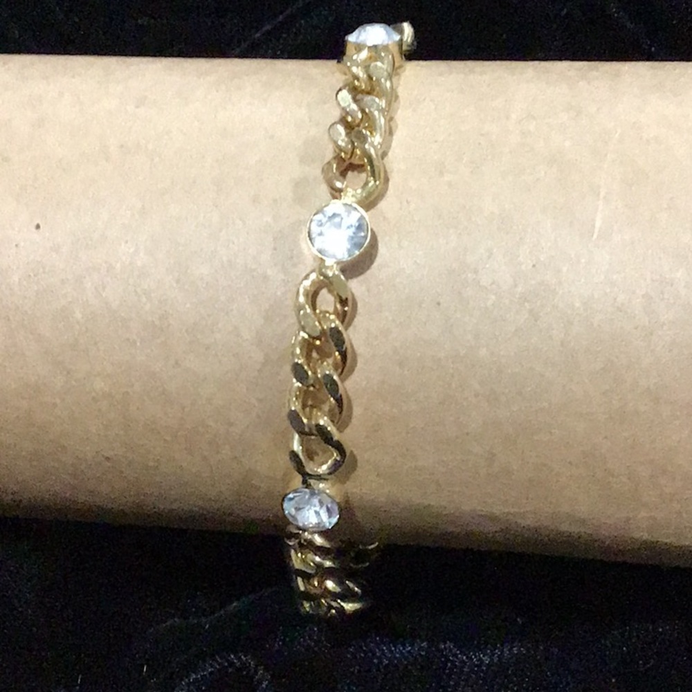 Gold tone bracelet with crystals